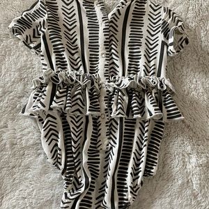 Kate Quinn baby girl ruffle bodysuit